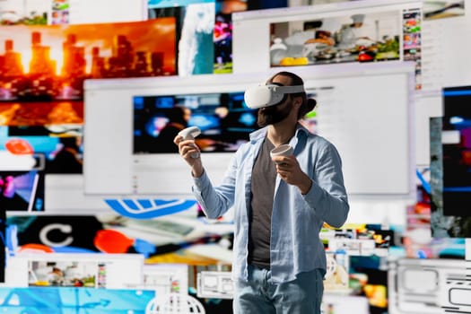 Modern cool man uses virtual reality glasses for a 3d web connection, vr simulation showcasing innovation for social media engagement. Influencer working on visual storytelling and global reach.