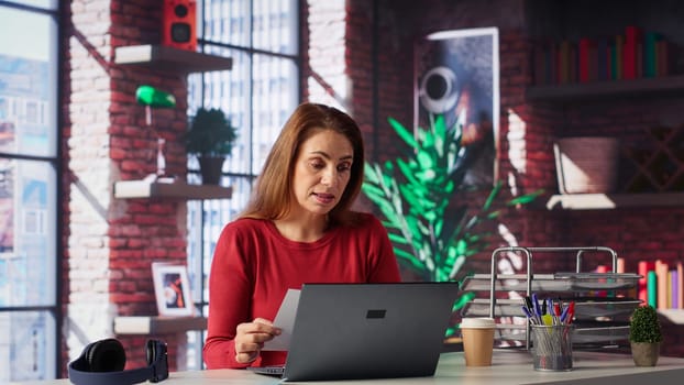 Female applicant at a virtual job interview chatting via online video call, applying for a job vacancy listed on a web recruiting platform. Ambitious woman looking to get hired, job offer. Camera A.