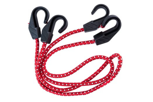Red bungee cord with four black plastic hooks on a white background. Durable elastic strap for securing items in transport, storage, or outdoor use.