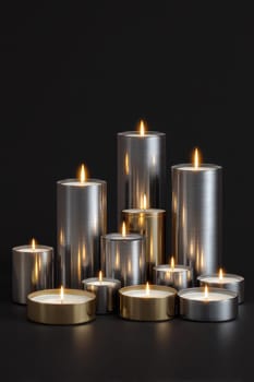 Collection of Various Tea Light Candles with Flickering Flames on a transparent Background Featuring Different Heights and Sizes in Metallic Containers..