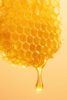 Golden Honey Dripping from Honeycomb Macro in Soft Pastel Light