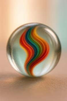 Tilt-Shift Macro of Color-Swirl Glass Marble in Warm Pastel Tones