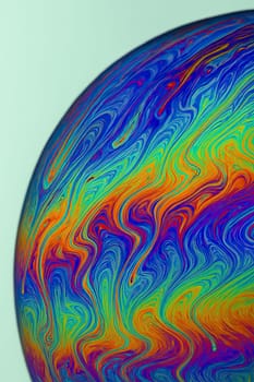 Macro of Iridescent Soap Bubble Film with Pastel High-Key Lighting