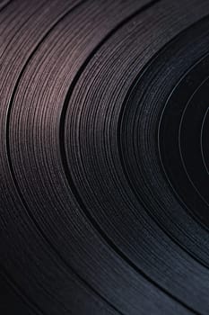 Macro of Vintage Vinyl Record Grooves under Soft Pastel Light