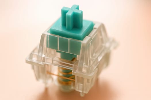 Macro of Mechanical Keyboard Switch Stem and Spring in Pastel Light