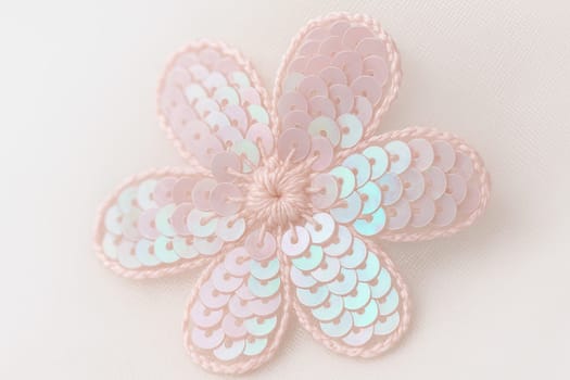 Macro of Pastel Sequin Embroidery Flower with Soft High-Key