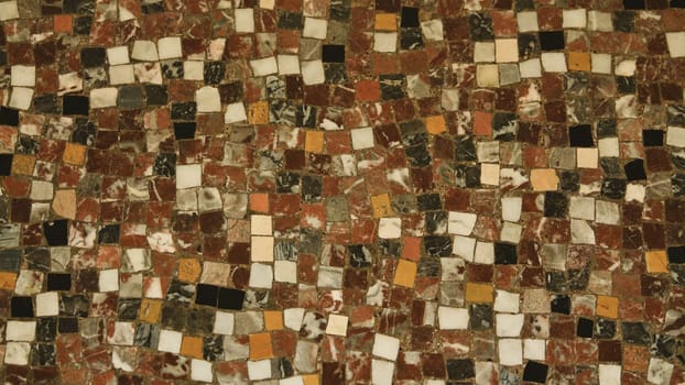 Small antique cracked brown beige white black mosaic tiles pattern background abstract pattern background