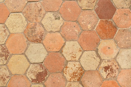 Hexagonal vintage antique beige tile in a french old manor Banner