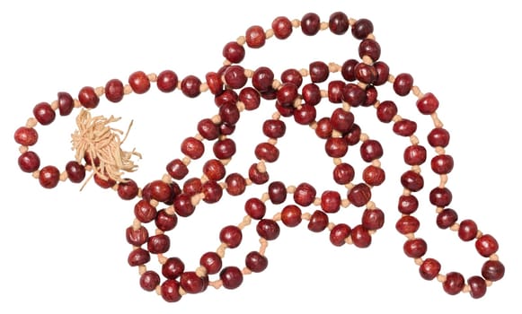 A string of red beads, made from sandalwood, with a light tassel, isolated background
