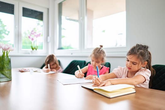 Children explore their creativity with colorful drawings.