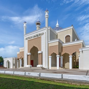 Brunei International Airport Mosque, in Bandar Seri Begawan, invites travelers and worshippers to experience its divine ambiance with its intricate design and expansive entrance under azure sky