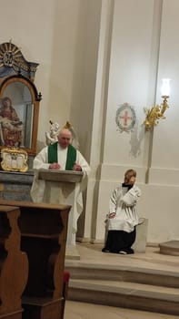 October 22 2024 Hradec Kralove, Czech Republic Europe, Kralov region, Kralovehradecky kraj Priest altar assistant. High quality photomen people architecture religion building culture tradition editorial shotlisttravel travel tourism