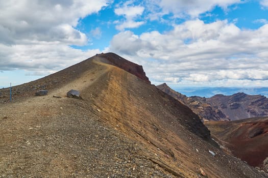 Volcanic landscape in Tongariro National Park, New Zealand, hiking trail in the mountains