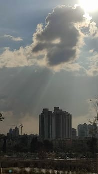 Sunlight cityscape clouds building landscape background . High quality photo