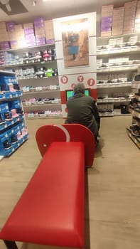October 22 2024 Hradec Kralove, Czech Republic Europe, Kralov region, Kralovehradecky kraj, Shoe store seating. High quality photo editorial shotlisttravel travel tourism business company commercial objects