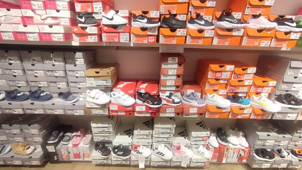 October 22 2024 Hradec Kralove, Czech Republic Europe, Kralov region, Kralovehradecky kraj, Shoes store shelves editorial information products shop . High quality photo commercial indoor industry