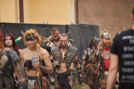 Jaromer, Czech Republic - August 13, 2022: Post-Apocalyptic LARP cosplay group walking on the festival grounds of Brutal Assault heavy extreme metal festival