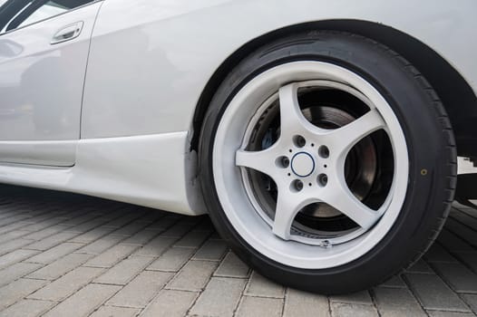 Close-Up of Custom Car Wheel and Tire Excellence