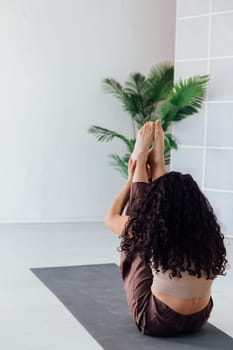 Sports Fitness Woman Brunette Doing Gymnastics Yoga Asana On The Floor