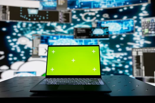 Surrounded by digital data and AI brain systems, laptop showcases green screen on a display. Automation platforms and cloud computing ensures a modern strategy and innovation.