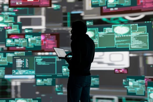 Conceptual representation of cyber crime with male hacker exploiting system vulnerability, using programming technique and surveillance to override digital defenses and leak information.