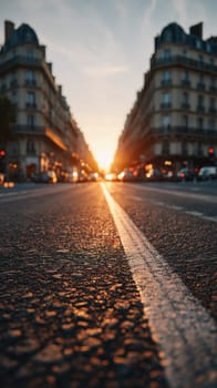 Elegant symmetrical Parisian Haussmann boulevard in soft morning light on street..