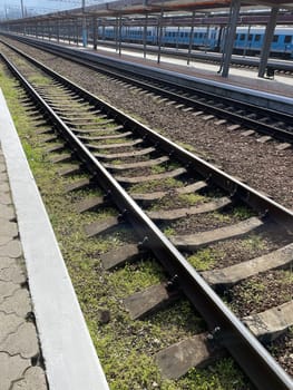Rails and train at the railway station