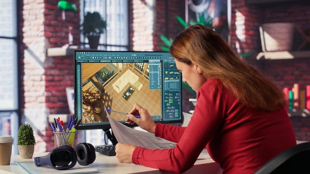 Remote worker in creative office uses CAD software and blueprints plan, design a house interior and provides a user interface for virtual home customization. Detailed architectural layout. Camera A.