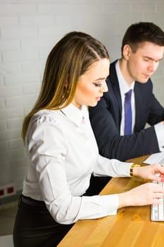 business couple working together on project at modern startup office