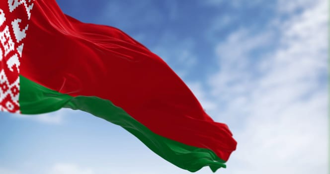 National flag of Belarus waving in the wind. Red and green flag with a white and red ornament pattern placed at the staff end.3d illustration render. Fluttering textile