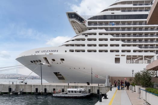 Istanbul, Turkey - May 5, 2023: MSC SPLENDIDA, Large cruise ship docked at terminal of Galataport, a mixed use development located along shore of Bosphorus strait, in Karakoy neighbourhood