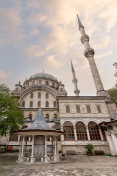 Courtyard of Nusretiye imperial Ottoman Mosque, with ablution fountain in the front, located in Tophane district of Beyoglu, Istanbul, Turkey