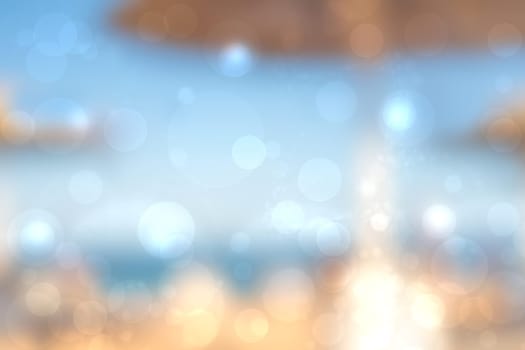Abstract sea background. Abstract tropical sandy summer beach background with bokeh lights on light blue sky and sun. Beautiful texture. Space.