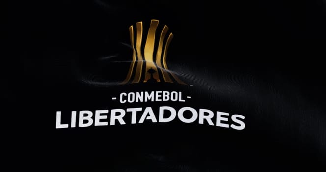 Buenos Aires, ARG, Sept 2022: CONMEBOL Libertadores flag waving in the wind. South American football competition organized annually by CONMEBOL. Illustrative editorial 3d illustration render. Close-up