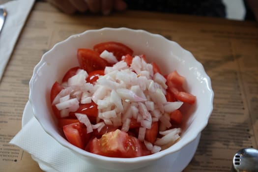 A delicious fresh tomato salad with bibels  Theme picture Croatia / Hrvatska / Croatia 2023