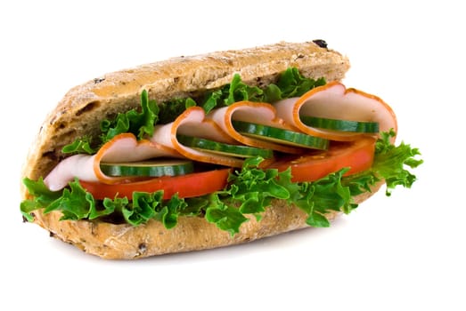 Freshly made ham and vegetable sandwich - isolated