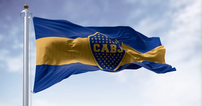 Buenos Aires, AR, June 15 2023: Boca Juniors flag waving in the wind. Argentine sports club based in Buenos Aires. Illustrative editorial 3D illustration render