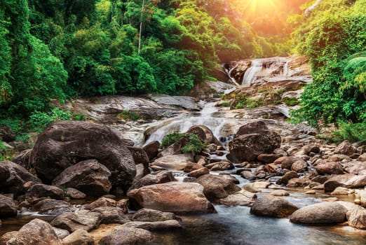 Water fall with sunlight and sunray and beautiful view nature