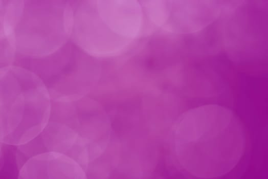 Light abstract pink bokeh christmas circle color glitter blurred black background