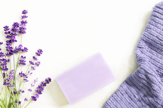 Fresh lavendar flowers with lavendar bath soap.