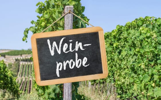 A Blackboard in the vineyards - Wine tasting in german - Weinprobe