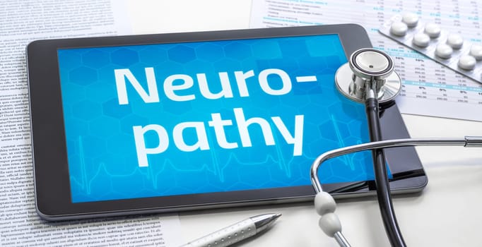 The word Neuropathy on the display of a tablet