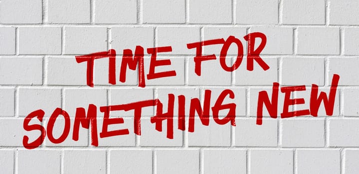 Graffiti on a brick wall - Time for something new