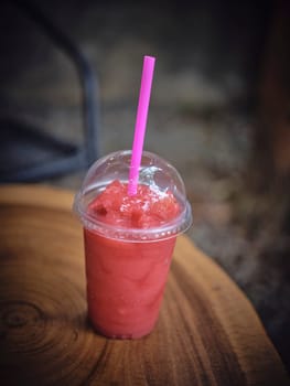 Fresh watermelon juice plastic takeaway . concept DELIVERY