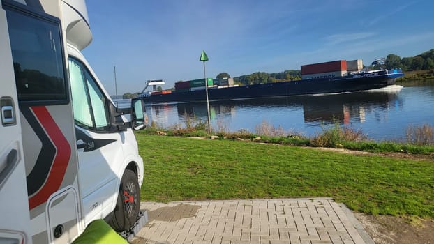 Blitterswijck, The Netherlands - Oktober 02, 2022: Campers parked on a Camer Van pitch. Concept camper van leisure and fun