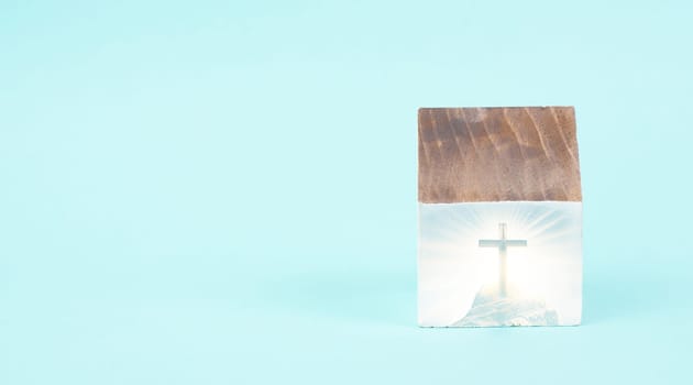 Wooden house with a religious cross, christian church, belief and faith concept, catholic and protestant community