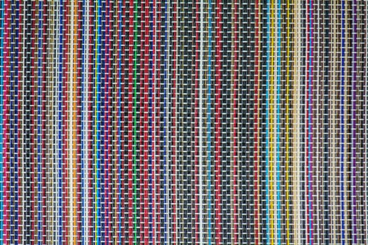The wicker surface is made with colorful patterns.