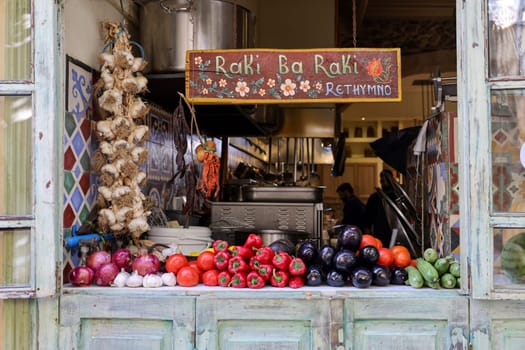 Rethymnon, Crete, Greece - Sept 18, 2021: Taverna Raki Ba Raki in Rethymon, Crete, Greece