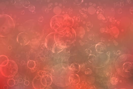 A festive abstract gradient orange pink red background texture with glitter defocused sparkle bokeh circles . Card concept for Happy New Year, party invitation, valentine or other holidays.