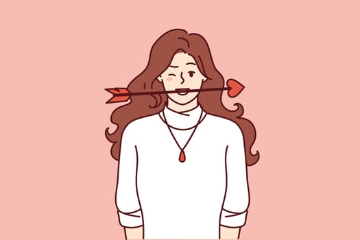 Woman in love with cupid arrow in mouth wants to seduce liked man or congratulate boyfriend on valentine day. Cupid girl winks looking at screen for concept of romance in relationship
